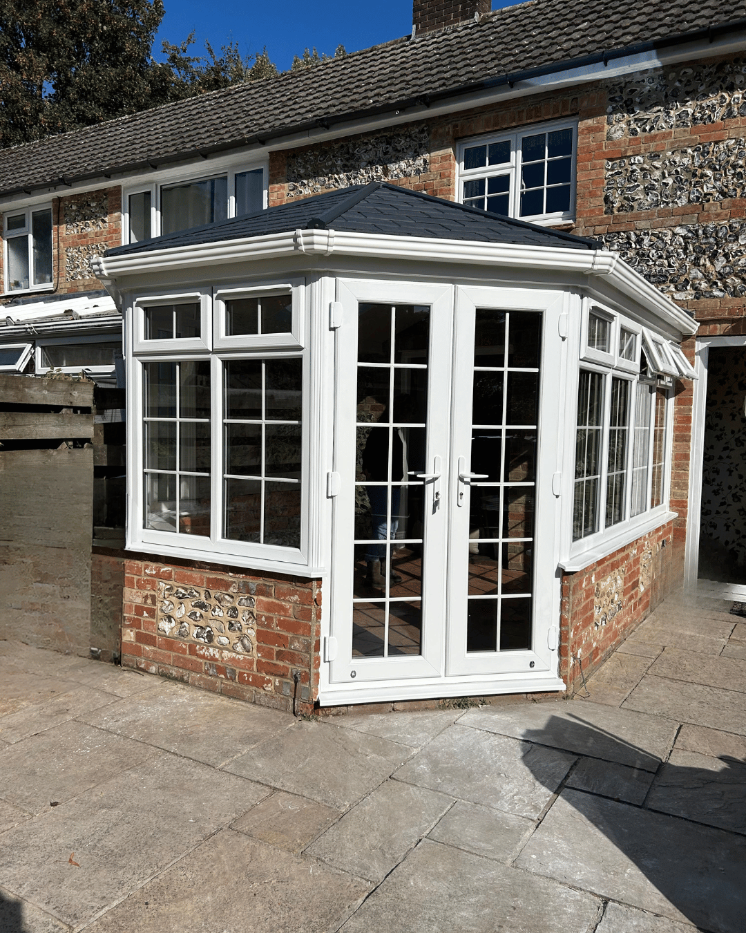 White tiled roof conservatory