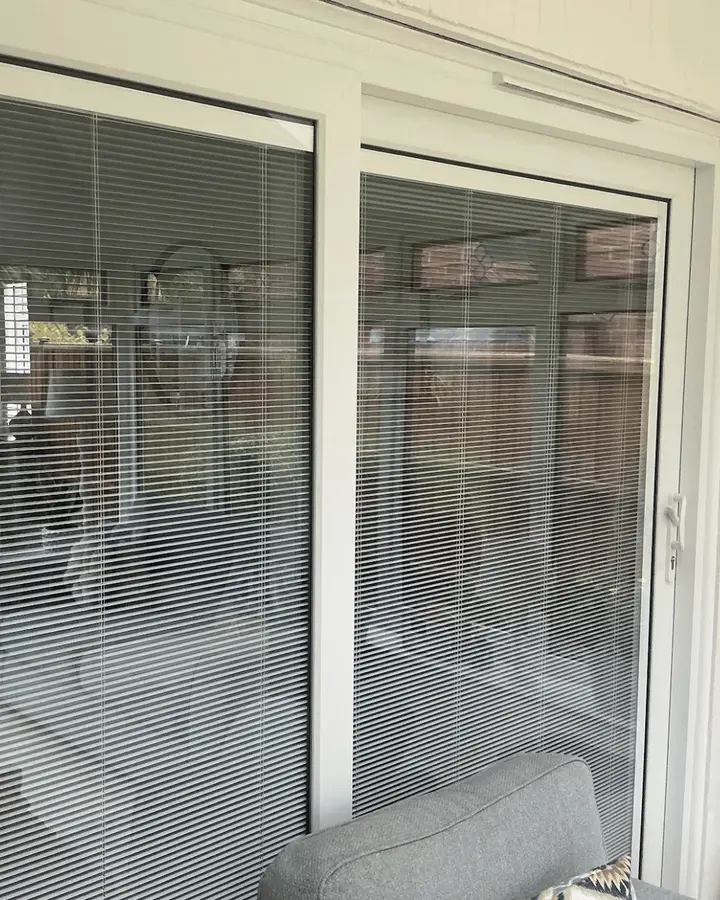 Sliding patio door with blinds